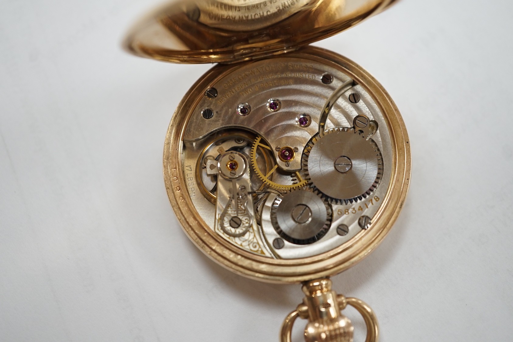 A George V 9ct gold Omega open face keyless pocket watch, case diameter 44mm, gross weight 63 grams.